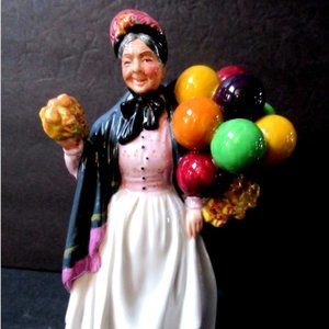 Royal Doulton Figurine Biddy Pennyfarthing HN1843  9" tall Mint Condition